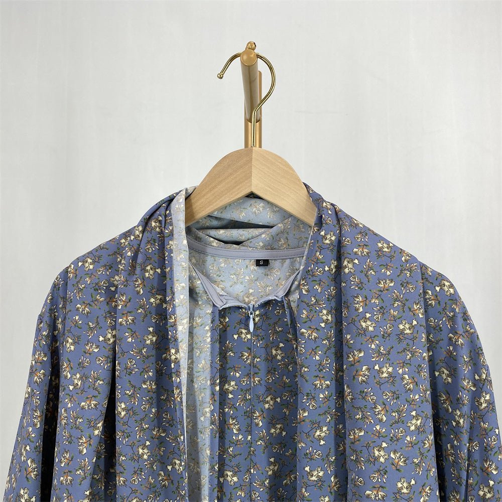 
                  
                    Floral Hooded Front-Zip Abaya in Gray - Modest Abaya with Floral Print and Zipper Closure
                  
                