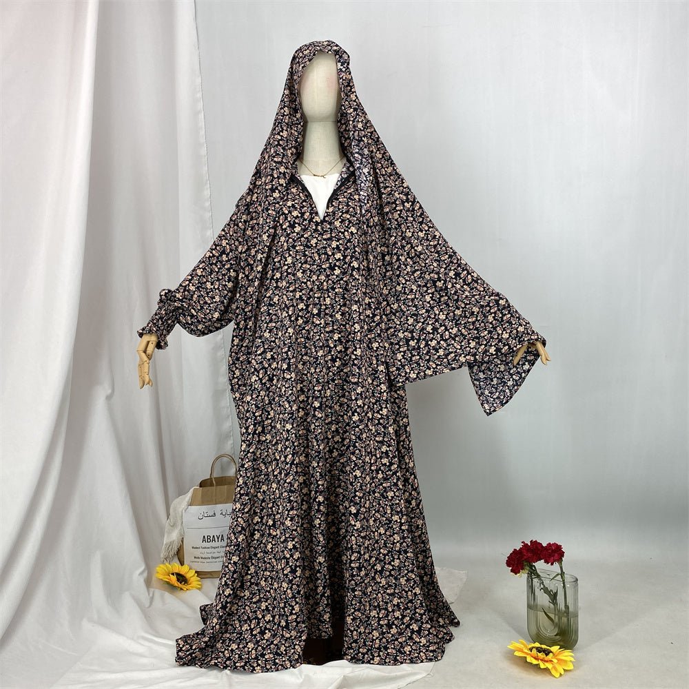 
                  
                    Floral Hooded Front-Zip Abaya in Beige - Modest Abaya with Floral Print and Zipper Closure
                  
                