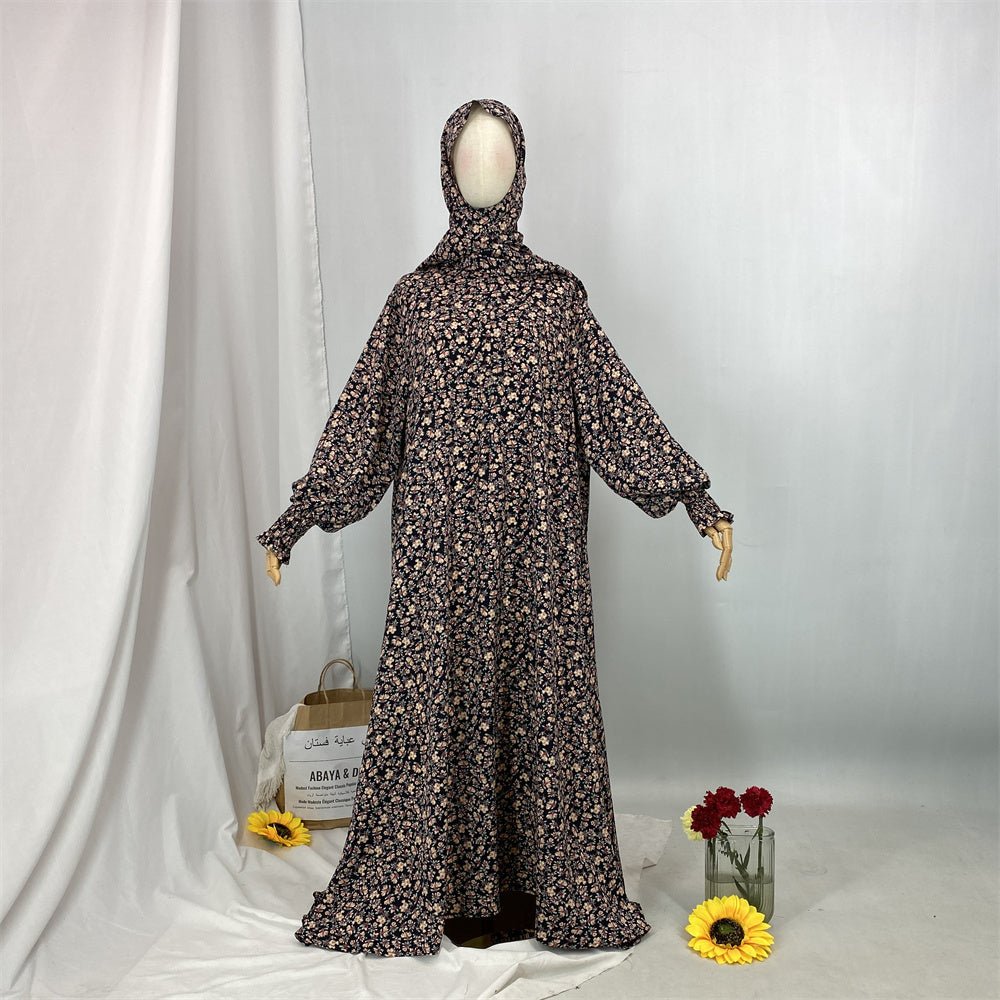 
                  
                    Floral Hooded Front-Zip Abaya in Beige - Modest Abaya with Floral Print and Zipper Closure
                  
                