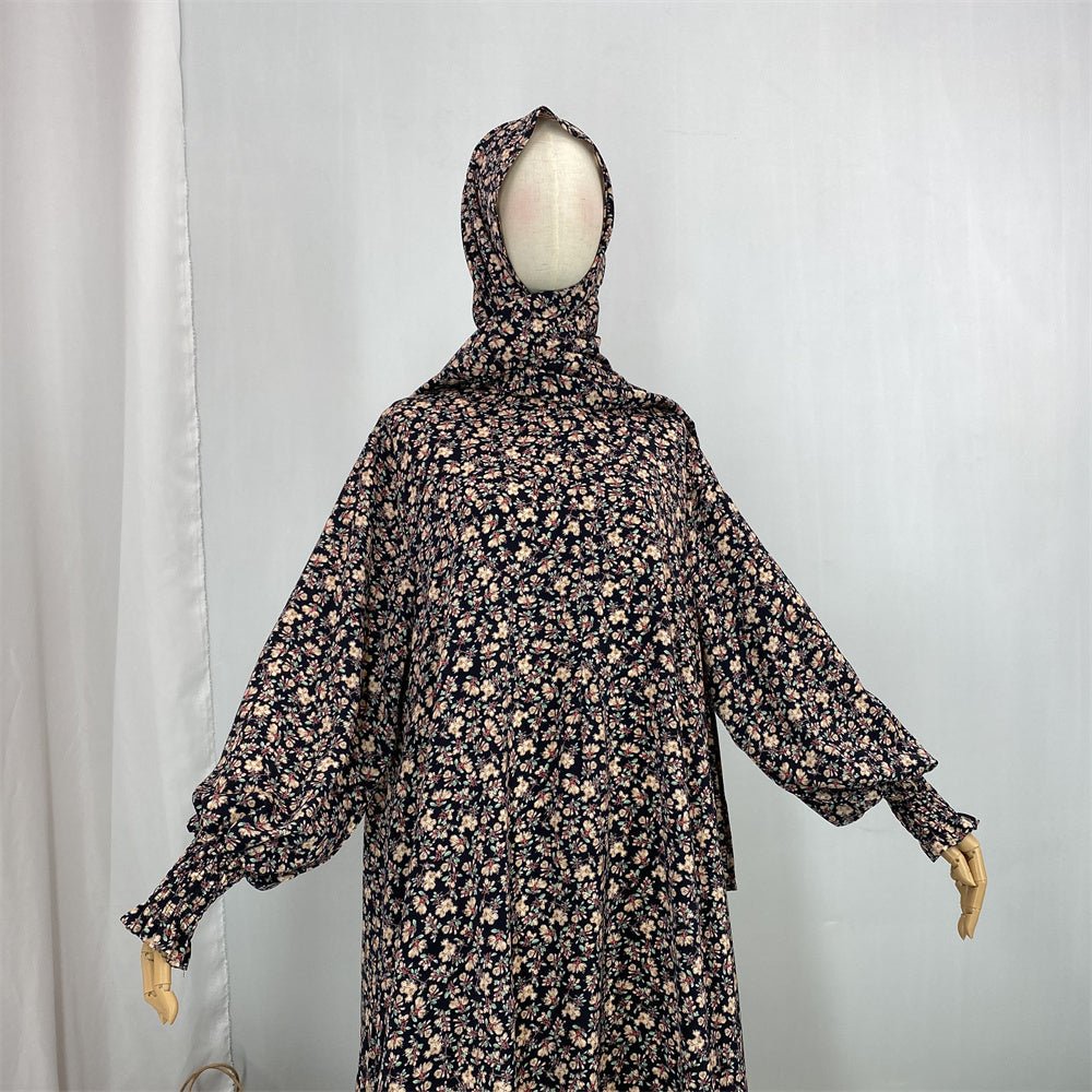 
                  
                    Floral Hooded Front-Zip Abaya in Beige - Modest Abaya with Floral Print and Zipper Closure
                  
                